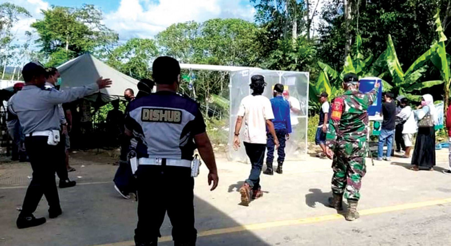 Tim Gugus Tugas melakukan penjagaan di wilayah perbatasan Berau. (File : Istimewa)