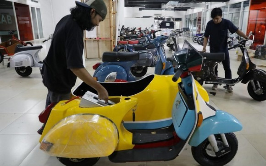 Program konversi sepeda motor listrik yang terus digenjot pemerintah. (Foto: CNNIndonesia)