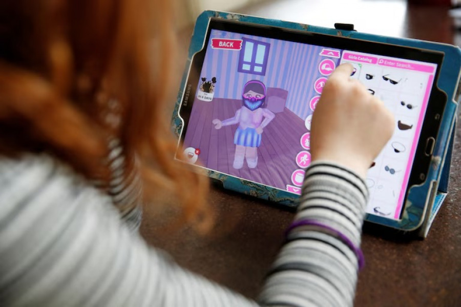Roblox mengeluarkan kebijakan baru yaitu menggunakan pengenalan wajah untuk memverifikasi usia pengguna dan membatasi obrolan. (reuters)