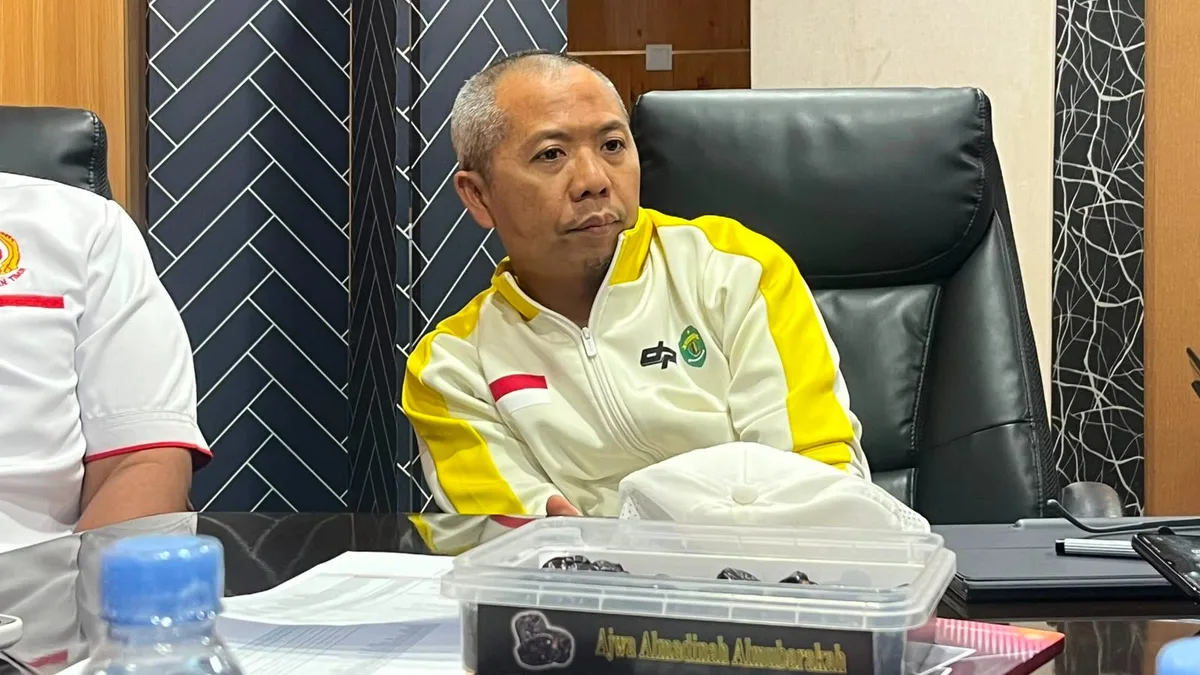 Plt Kepala Dispora Kaltim, Rasman Rading usai menggelar rapat persiapan jelang Porprov 2026 di Kantor KONI Kaltim, Jumat (31/7/2026) (Rafik/Korankaltim.com)